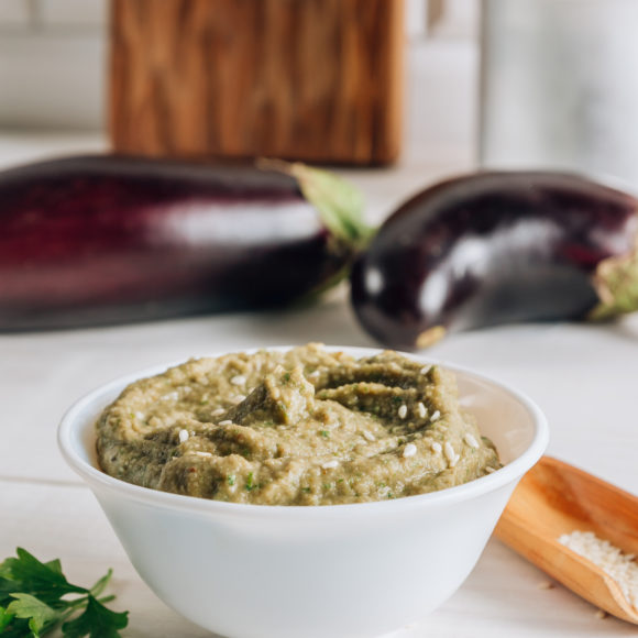 traditional arabian eggplant dip baba ganoush white wooden table selective focus 580x580